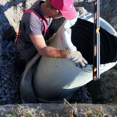 Выравнивание дренажного колодца